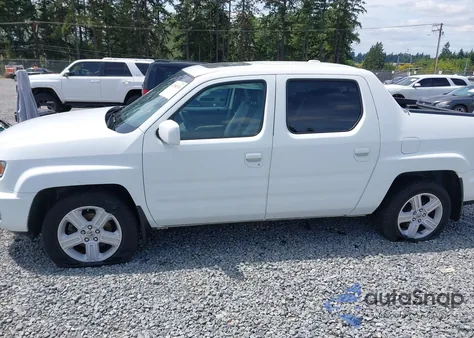 2011 Honda Ridgeline Rtl z USA, uszkodzony, nr VIN 5FPYK1F59BB007577